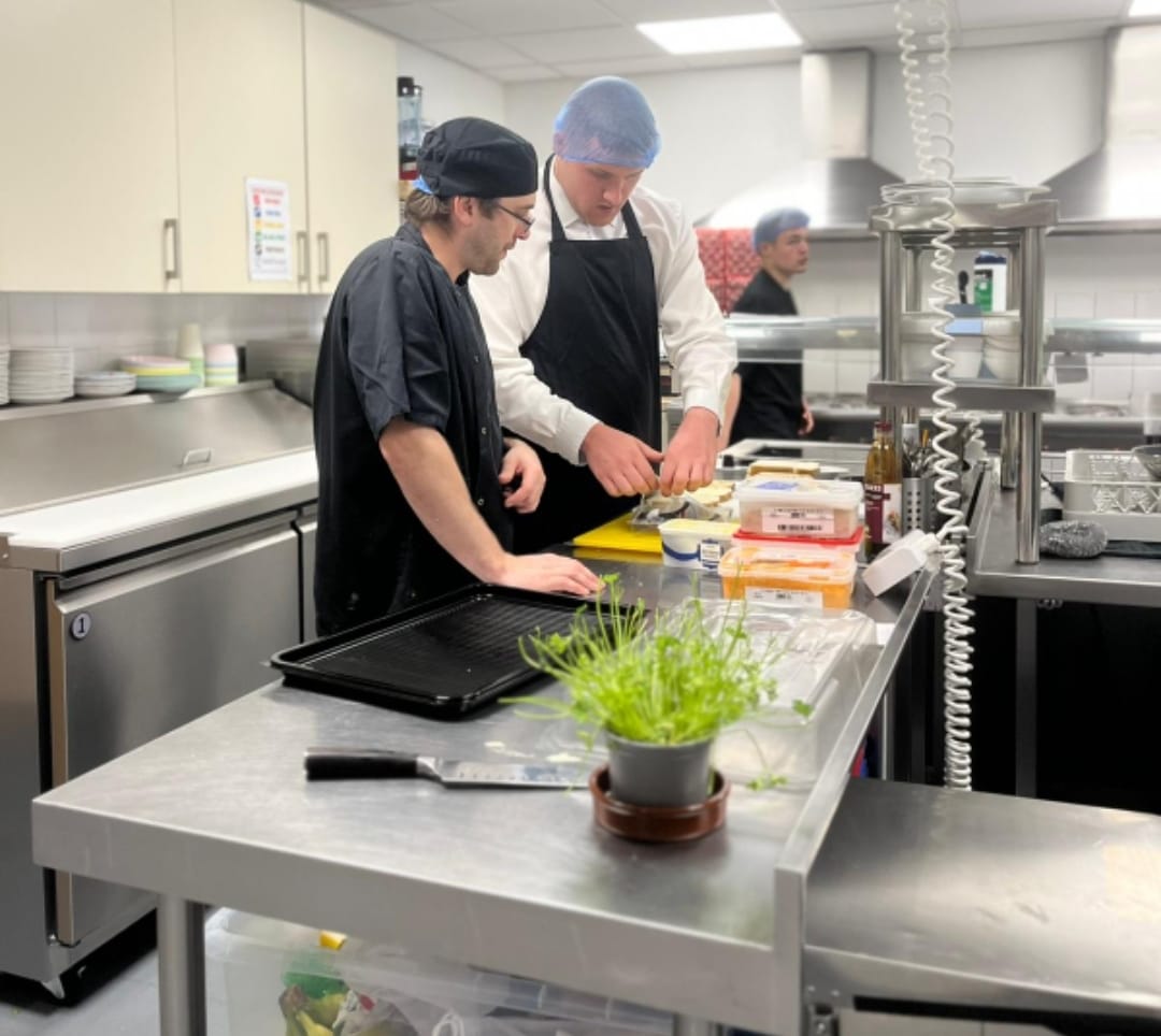 Kitchen staff at work in Café Cornell