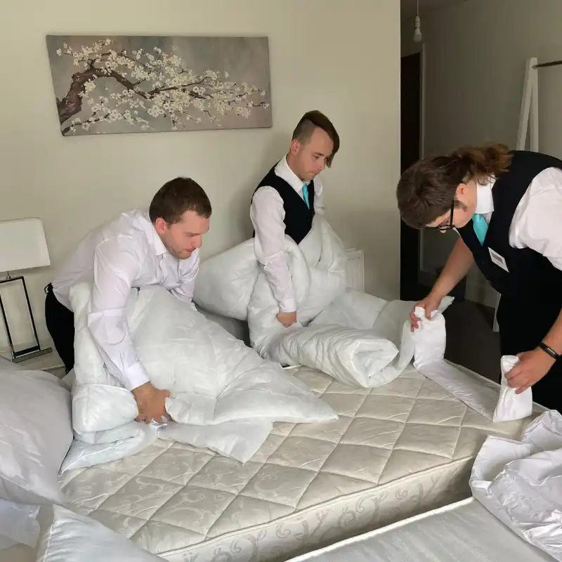 Students making a bed