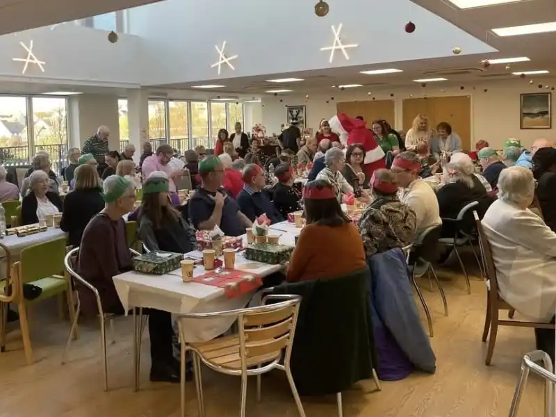 Local people at a #LetsEatTogether Christmas Event